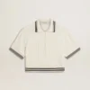 Damska krótka bawełniana koszulka polo w stylu „worn-white” z niebieskimi ściągaczami