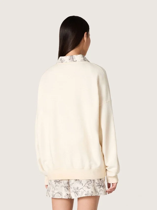 Bawełniana bluza unisex „Star” w kolorze vintage white z haftowanymi naszywkami VCE