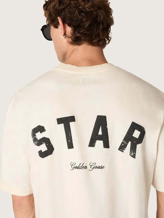 Bawełniana koszulka unisex „Star” w kolorze vintage white z czarnym nadrukiem na plecach