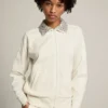 Biała bluza z zamkiem z kolekcji Denise Star Collection w kolorze papirusowym z kołnierzem z kryształkami
