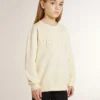 Bluza dla dziewczynek w kolorze kremowym z naszywką z napisem