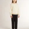 Bluza dla dziewczynek w kolorze kremowym z naszywką z napisem