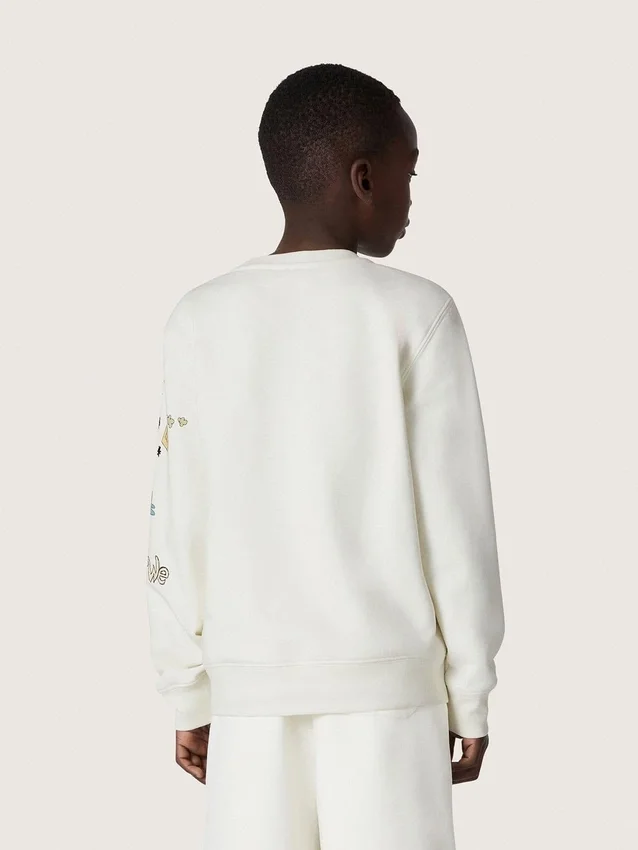 Bluza unisex „Journey” z białej mieszanki bawełny z nadrukiem w stylu doodle