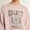 Bluza unisex z okrągłym dekoltem w kolorze starej róży z zielonym nadrukiem logo