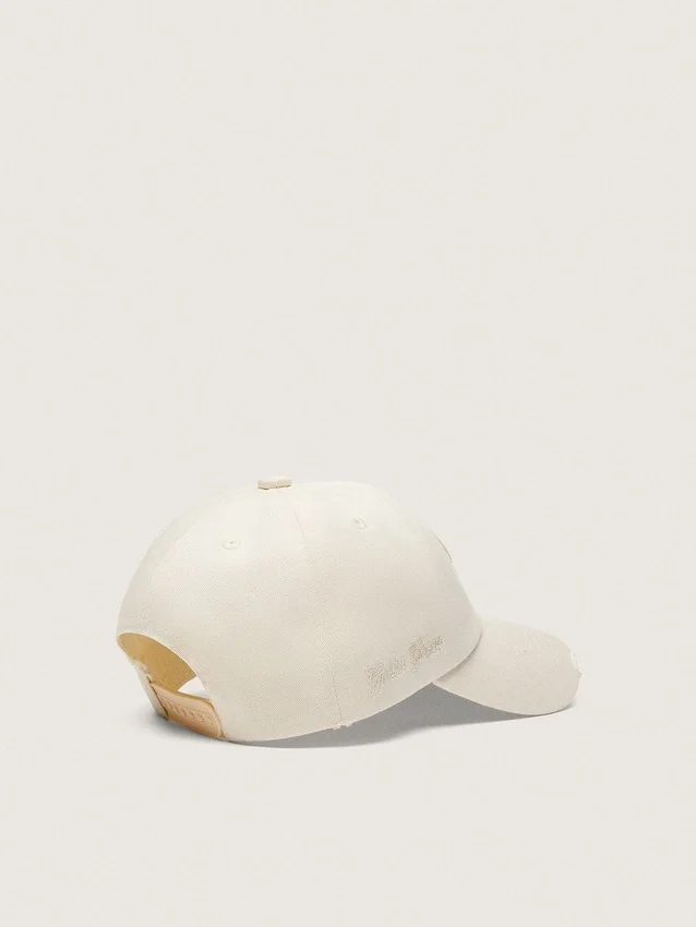 Czapka z daszkiem Journey z białej bawełnianej tkaniny skośnej z naszywką i haftem golden goose