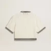 Damska krótka bawełniana koszulka polo w stylu „worn-white” z niebieskimi ściągaczami