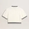 Damska krótka bawełniana koszulka polo w stylu „worn-white” z niebieskimi ściągaczami