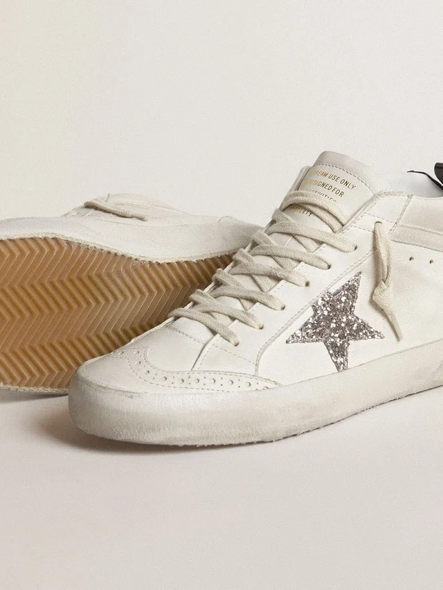 Damskie buty Mid Star ze srebrną brokatową gwiazdą i czarną laminowaną wstawką na pięcie