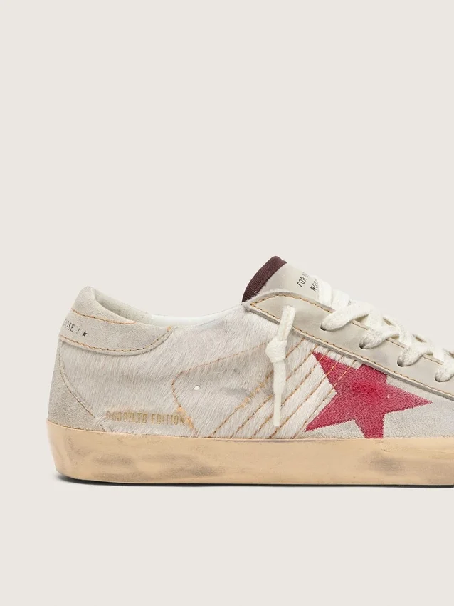 Damskie buty Super-Star LTD z białej skóry kucyka z czerwoną zamszową gwiazdą