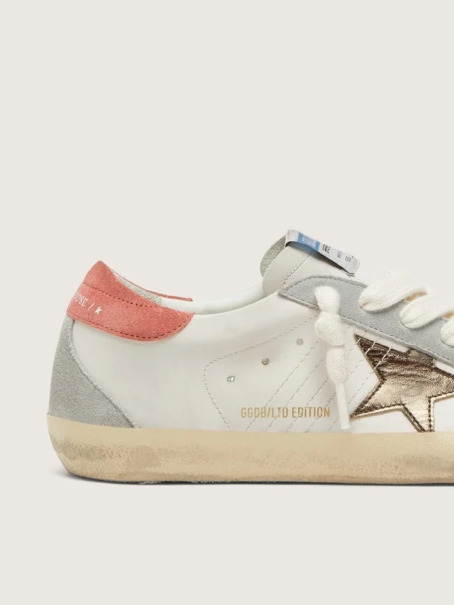 Damskie buty Super-Star LTD z białej skóry z metaliczną brązową gwiazdą
