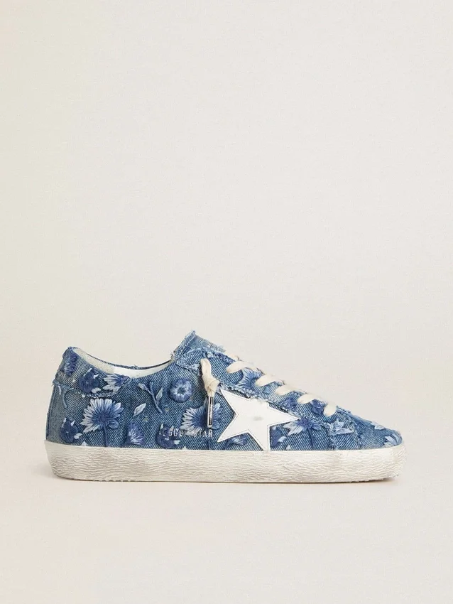 Damskie buty Super-Star LTD z jasnoniebieskiego denimu z białą skórzaną gwiazdą i haftowanymi kwiatami