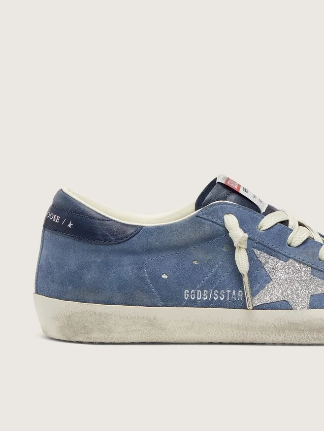 Damskie buty Super-Star z dżinsowo-niebieskiego zamszu z srebrną gwiazdą z brokatem