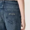 Dziewczynkowe dżinsy typu bootcut z niebieskiego denimu z cyrkoniami w stylu gradientowym