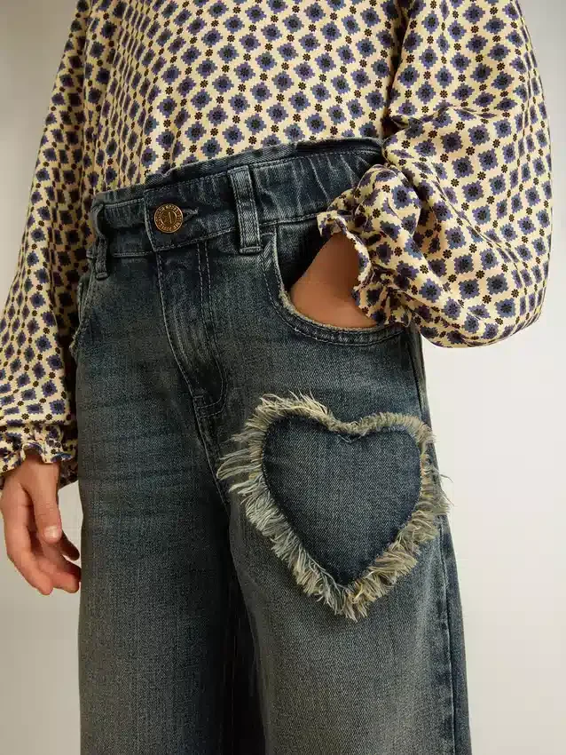 Dziewczynkowe dżinsy z szerokimi nogawkami z niebieskiego denimu