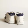 June Junior z nappy z ciemnoniebieską zamszową gwiazdką i zakładką na pięcie
