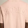 Koszulka w kolorze pudrowego różu z odwróconym logo z tyłu – Jersey Capsule