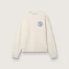 Kremowa bluza LTD z haftowaną naszywką