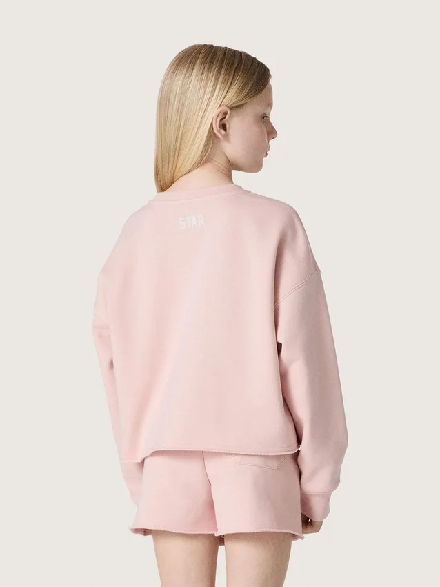 Krótka bluza dziewczynkowa „Star” z różowej bawełny z naszywką i logo