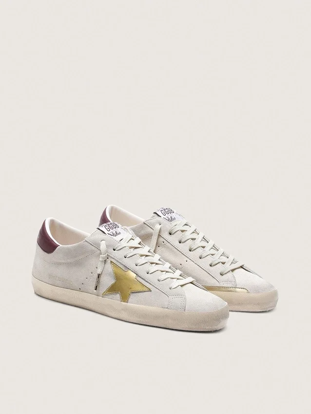 Damskie buty Super-Star CNY z zamszu w kolorze kości słoniowej z metaliczną skórzaną gwiazdą i skórzaną wstawką na pięcie