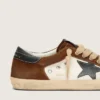 Męskie buty Super-Star z białej skóry i brązowego zamszu z czarną skórzaną gwiazdą