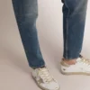 Męskie buty Super-Star ze złotym, błyszczącym paskiem i napisem