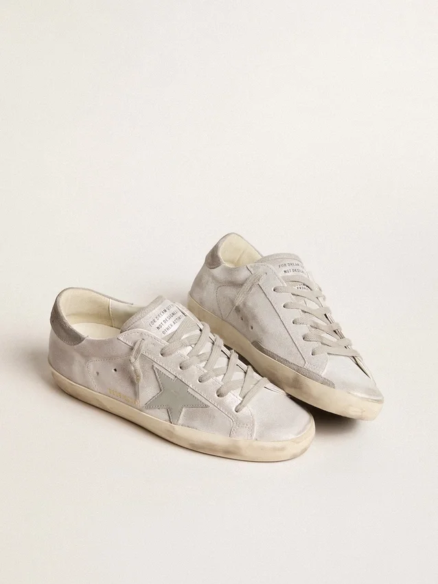 Sneakersy Super-Star z szaro-białej skóry z efektem brokatu i skórzaną gwiazdką