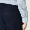 Spodnie chino Journey unisex z niebieskiego płótna bawełnianego z haftowanym logo