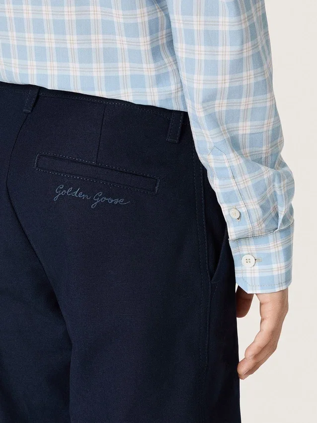 Spodnie chino Journey unisex z niebieskiego płótna bawełnianego z haftowanym logo