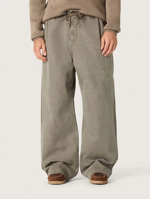 Spodnie unisex z szarego dżinsu ze sznurkiem i gwiazdą