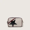 Star Bag Mini z białej jak masło skóry z czarną gwiazdą oraz bordowymi i ciemnoniebieskimi detalami