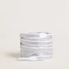 Sznurowadła Swarovski z kontrastującym szarym logo