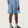 Szorty unisex Journey z jasnoniebieskiej bawełny typu chambray z haftowanym logo