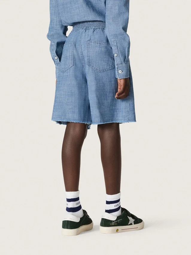 Szorty unisex Journey z jasnoniebieskiej bawełny typu chambray z haftowanym logo