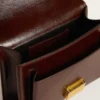 Torebka Venezia z ciemnobrązowej laminowanej skóry ze złotymi detalami