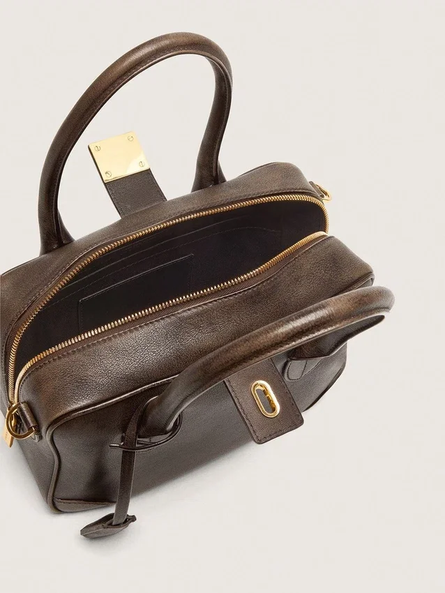 Torebka Vita z brązowej skóry w stylu vintage ze złotymi detalami