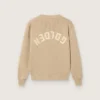 Unisexowy sweter dla dzieci w kolorze złotego beżu z prążkowanym wzorem i logo z tyłu