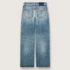 Złote damskie dżinsy typu boyfriend z jasnoniebieskiego denimu w stylu stone-washed