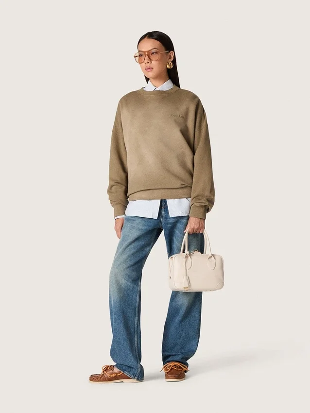 Złote damskie dżinsy typu boyfriend z jasnoniebieskiego denimu w stylu stone-washed