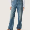 Złote damskie dżinsy typu boyfriend z jasnoniebieskiego denimu w stylu stone-washed