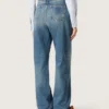 Złote damskie dżinsy typu boyfriend z jasnoniebieskiego denimu w stylu stone-washed